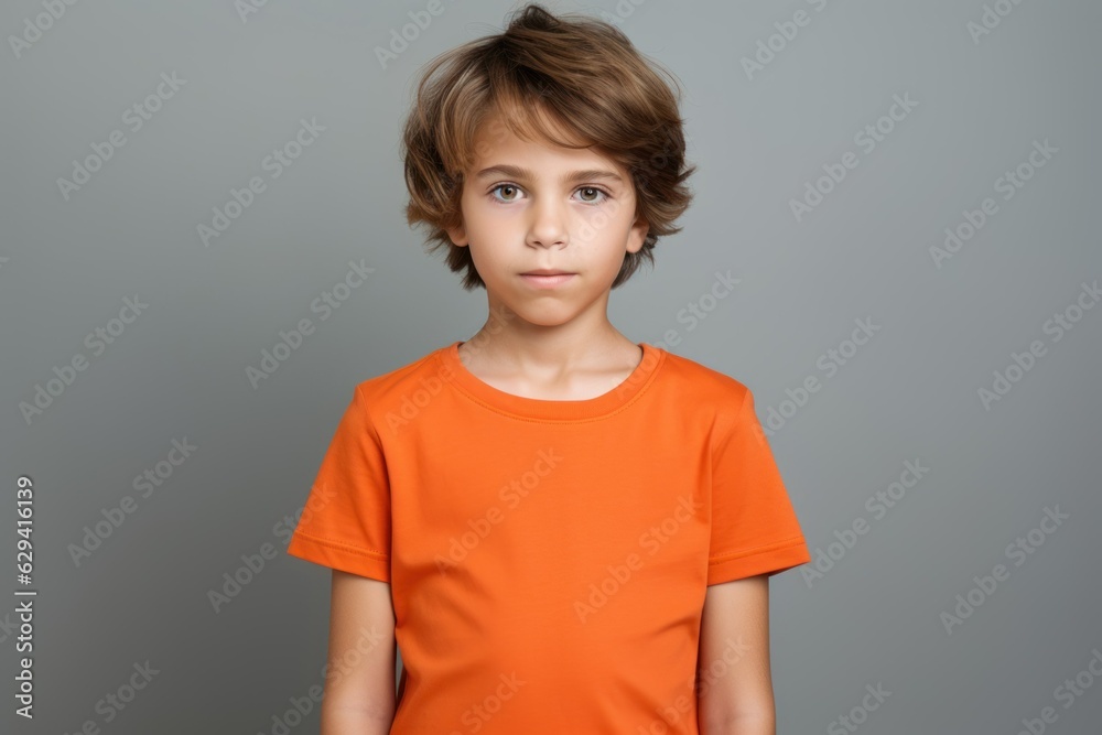 Cute fictional little child in plain orange t-shirt. Generative AI. Cute fictional little child in plain orange t-shirt. Generative AI.