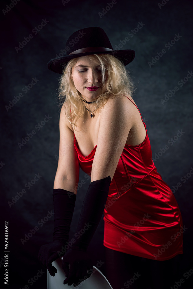 Beautiful woman wear elegant red dress posign at studio Beautiful woman wear elegant red dress posign at studio