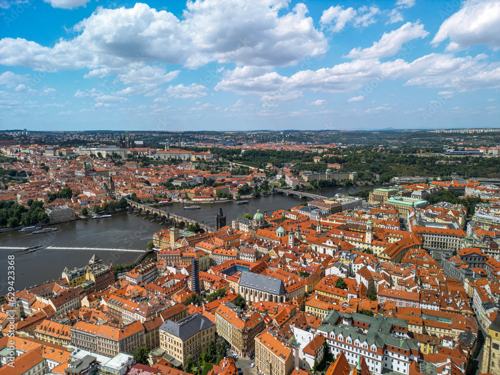 The drone aerial panoramic view of River Vltava runs through Prague city, Czech Republic. 