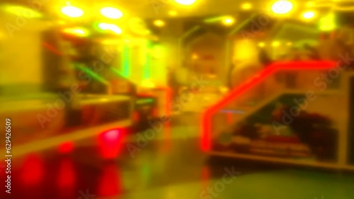 Yellow neon blur game center game arcade fun energitic area photo