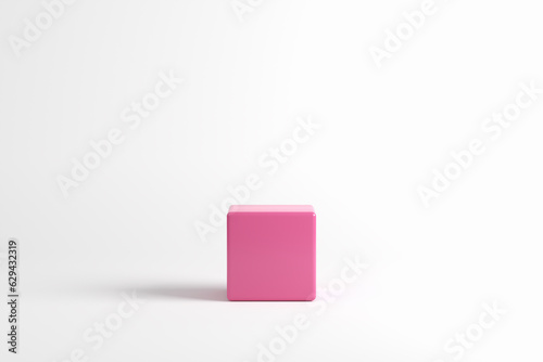 Pink cube podium or platform on white background for product display and presentation.