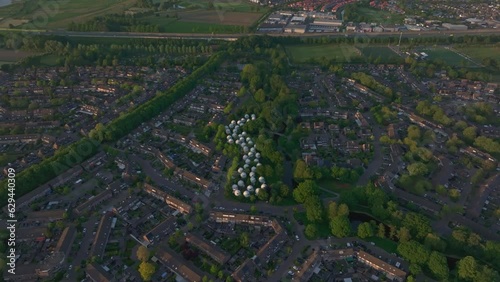 Reveal shot of The Bolwoningen 's-Hertogenbosch with soft light, aerial photo