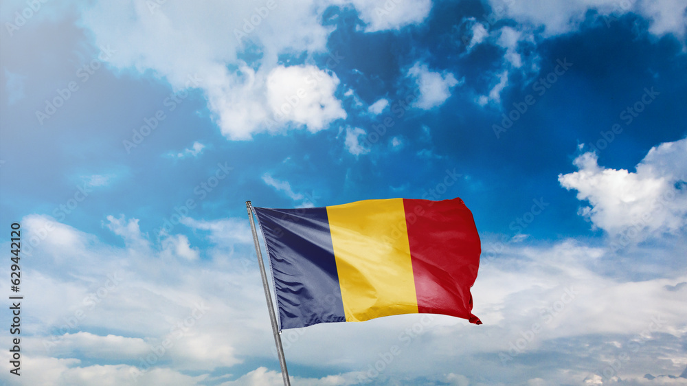 Fototapeta premium mavi gök yüzü arka planında çad bayrağı Translation: flag of chad on blue sky background