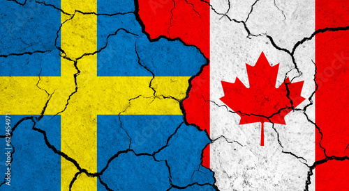 Flags of Sweden and Canada on cracked surface - politics, relationship concept