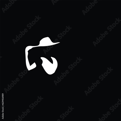 Silhouette of female with  in a cap. Black silhouette of woman in a black background.