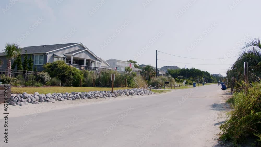 Coastal homes from a street view. Coastal homes from a street view.
