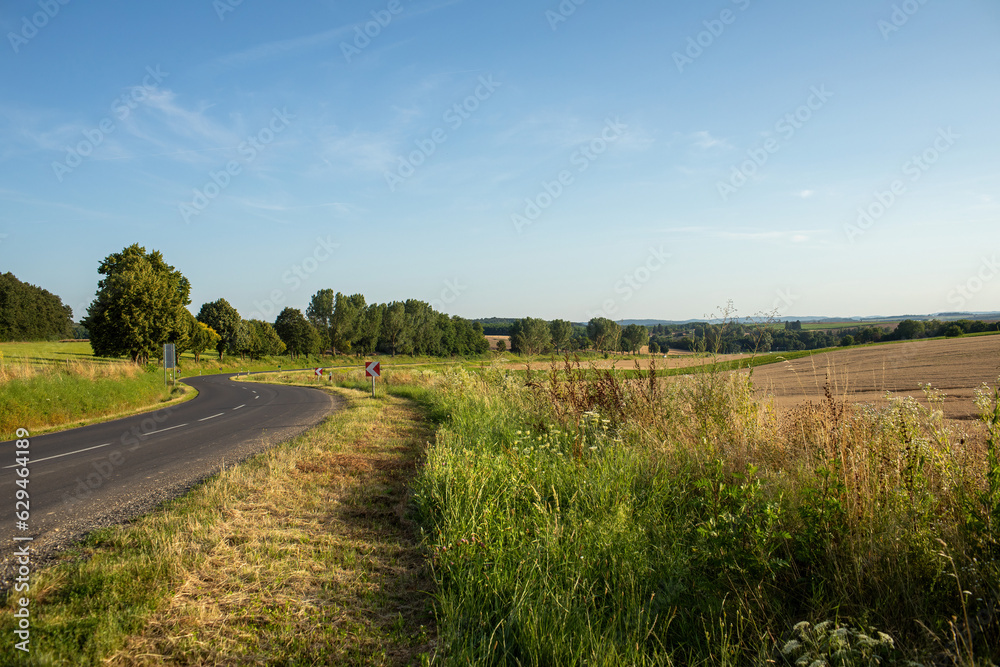 Country road on a sunny day.High quality photo. Country road on a sunny day.High quality photo.