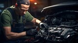 auto mechanic is fixing car in the garage, car engine in the garage, car in service