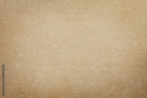 Old cardboard sheet texture background, pattern of brown kraft paper with vintage style.