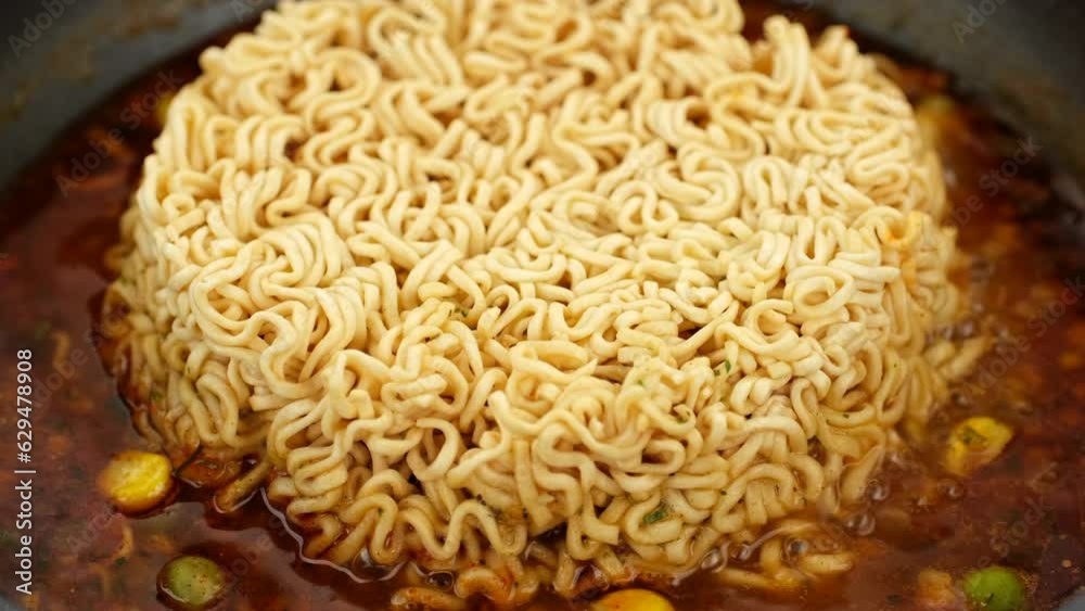 Cooking delicious traditional noodles, served with vegetables and herbs, spicy Cooking delicious traditional noodles, served with vegetables and herbs, spicy