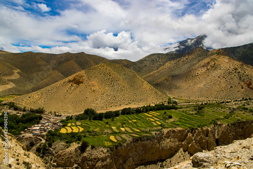 Breathtaking Landscape of Upper Mustang Desert Landscape alongside Kaligandaki River in Nepal photo