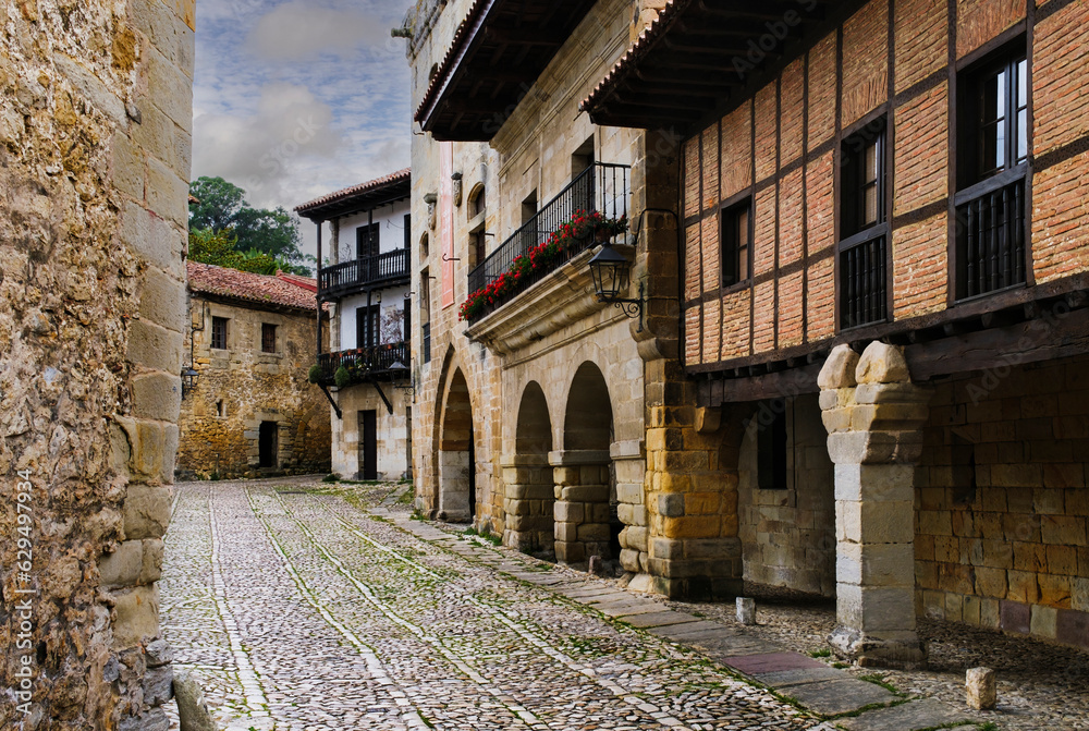 View of a street in the Cantabrian town of Santillana del Mar. It is considered one of the most beautiful and touristic villages in Spain.