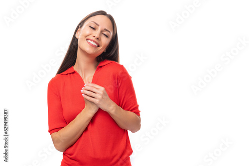 Fotografie young optimistic charming caucasian female model with black straight hair wearin