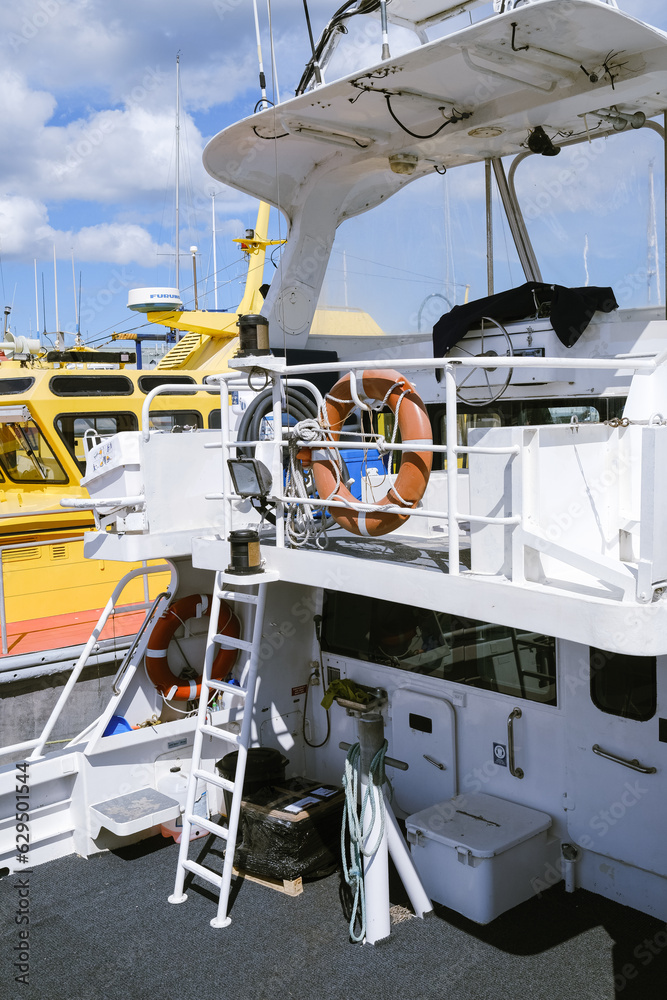 Fototapeta premium Close-Up of Docked White Boat with Nautical Equipment at Williamstown Marina