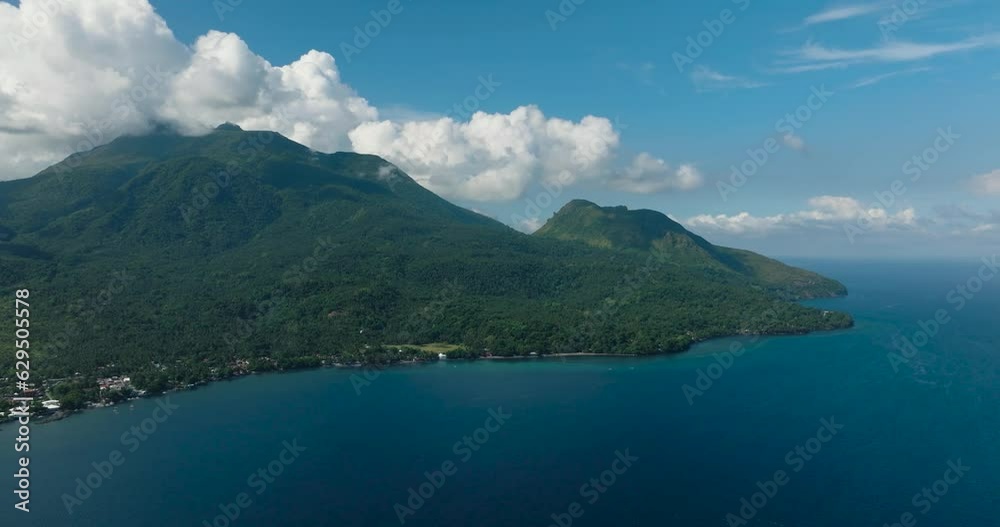 Tropical Island surounded by deep blue sea. Camiguin Island. Philippines. Tropical Island surounded by deep blue sea. Camiguin Island. Philippines.