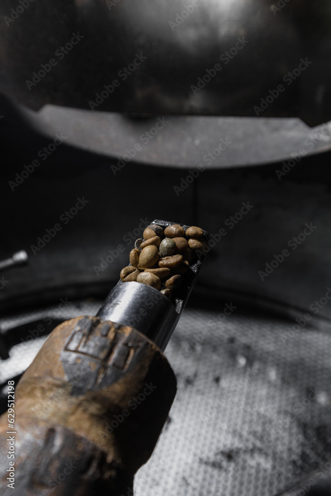 Close up of modern coffee bean roasting machine
