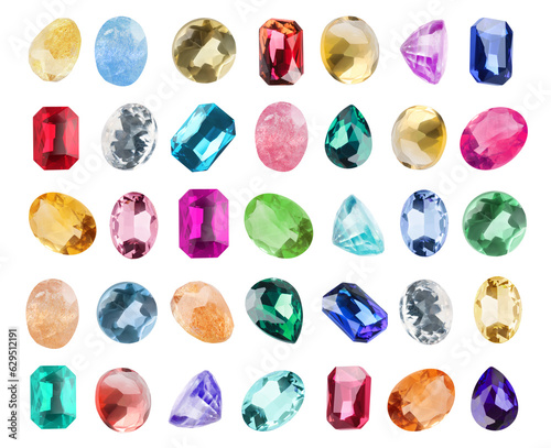 Set of different shiny gemstones for jeweler isolated on white