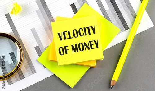 VELOCITY OF MONEY text on sticky on sticky on chart with pen