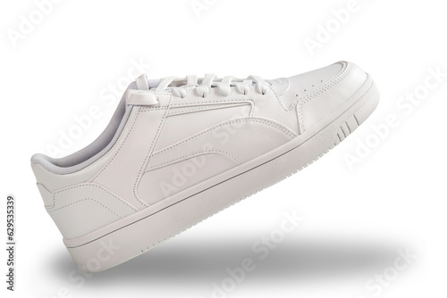 Casual white shoes on a white background close-up.