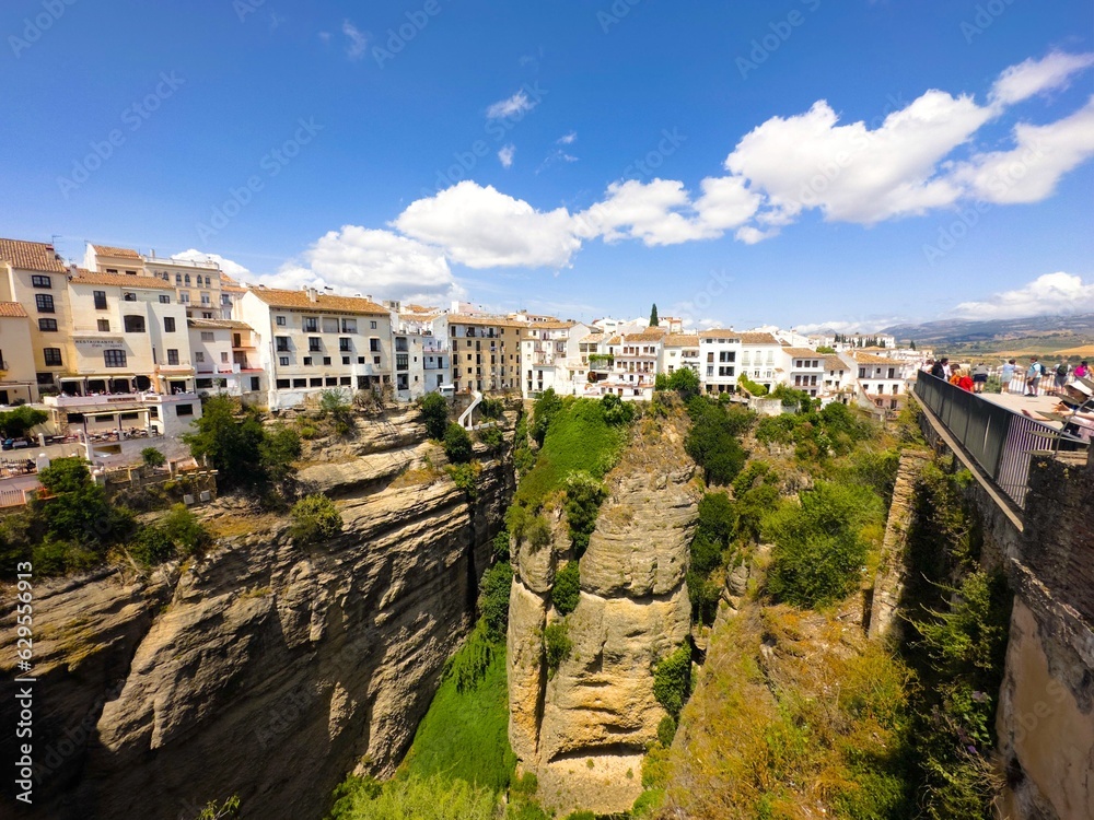 stunning view from the famous Puente Nuevo bridge over the El Tajo de Ronda canyon with the Guadalevín River in Ronda, Málaga, Andalusia, Spain