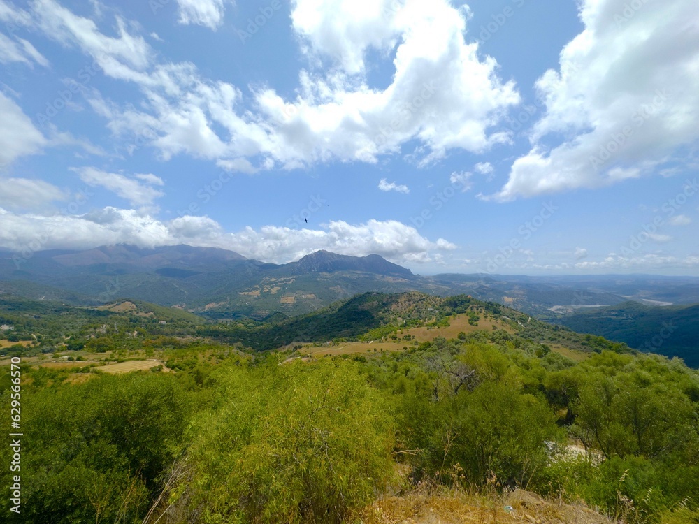 view over the hilly Andalusian landscape between the mountain villages Gaucin, and Casares, Paraje Natural Los Reales de Sierra Bermeja, Estepona, Andalusia, Malaga, Spain