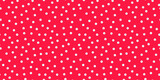 Small polka dot seamless pattern background. random dots texture. red and white dots textile