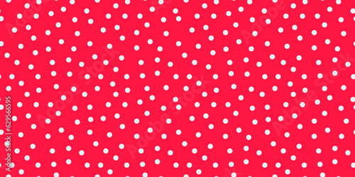Small polka dot seamless pattern background. random dots texture. red and white dots textile photo