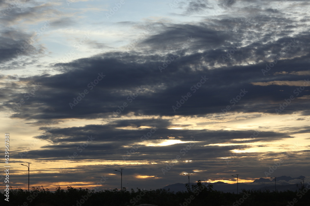 Golden clouds in the evening day with sunsets
