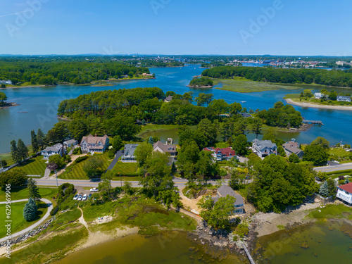 Historic waterfront house aerial view at the mouth of Piscataqua River in town of Rye with New Castle town at the background, New Hampshire NH, USA.  photo