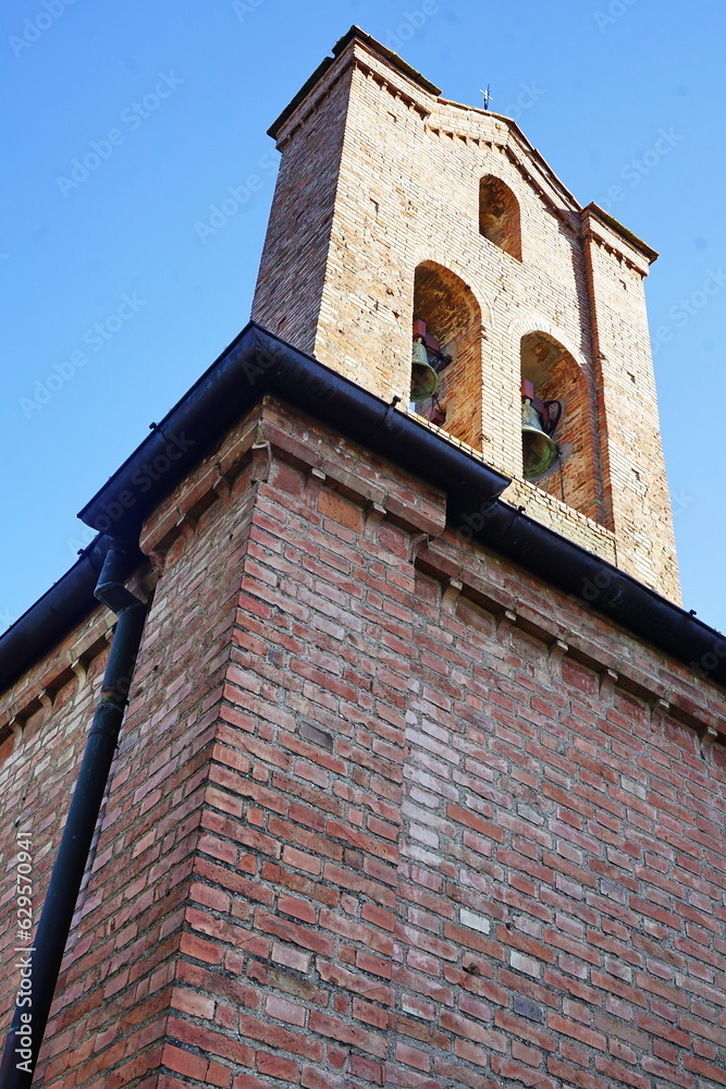 Fototapeta premium Bell tower of the church of Ippolito and Biagio Saints in Castelfiorentino, Tuscany, Italy