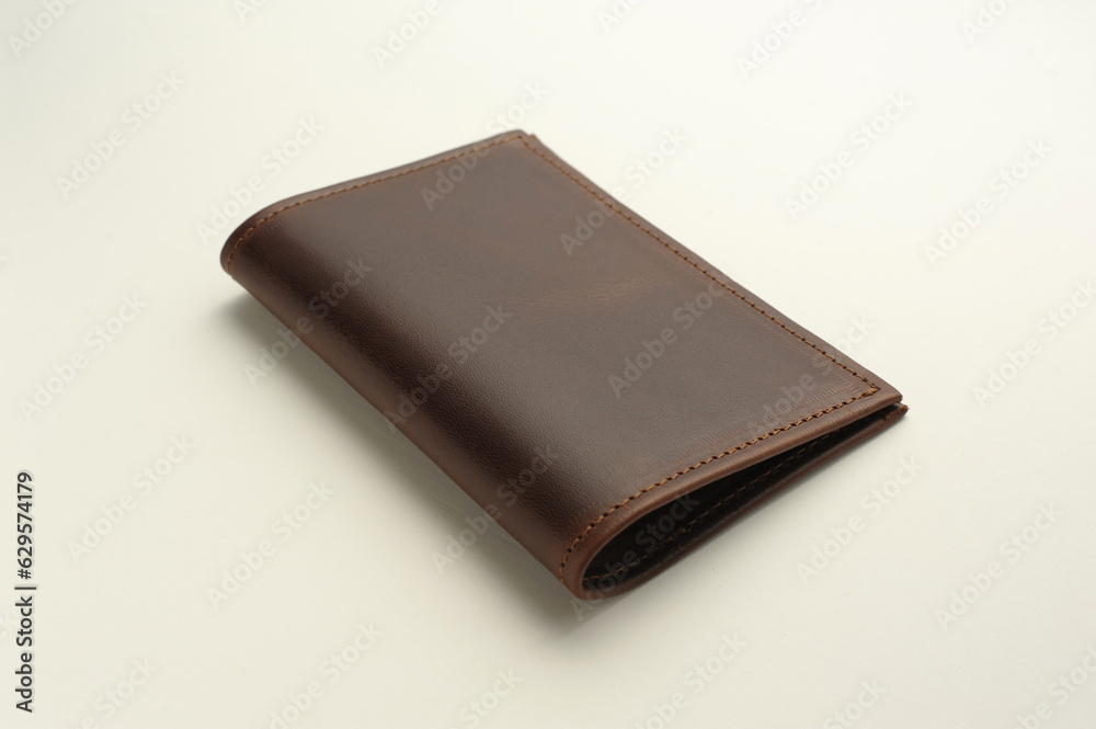 front side of a leather brown male cover for documents on a white background front side of a leather brown male cover for documents on a white background