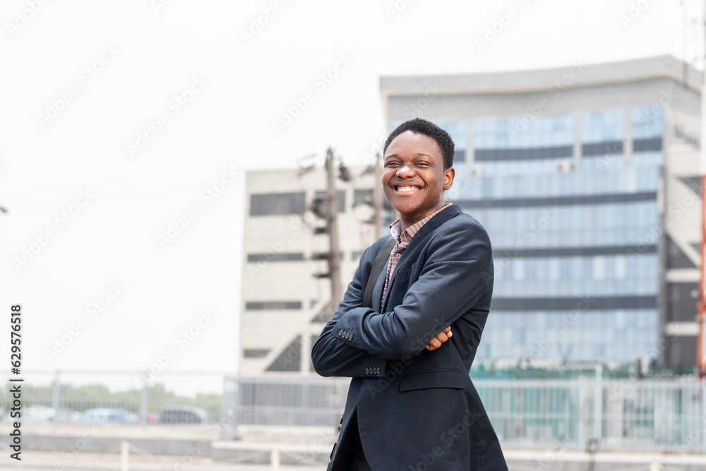 portrait of a young african businessman outdoors
