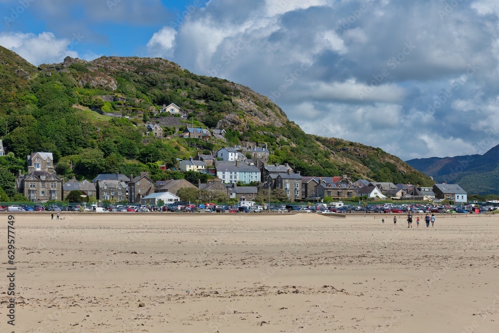 view of the town of Barmouth from the beach, UK