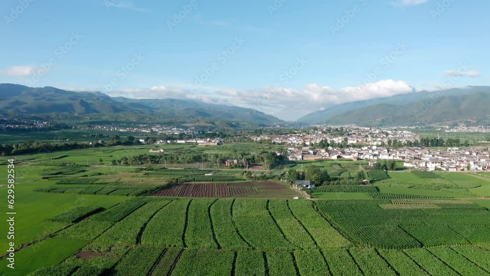 Village and fields in Shaxi, Yunnan, China. Village and fields in Shaxi, Yunnan, China.