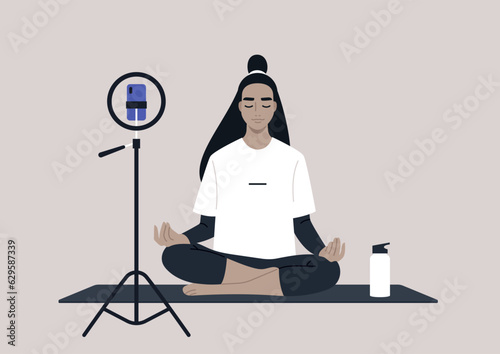 Young calm Asian character meditating in a lotus yoga pose, mindful lifestyle concept, an online workout scene