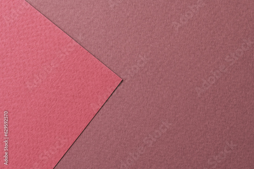 Rough kraft paper background, paper texture different shades of burgundy red. Mockup with copy space for text.