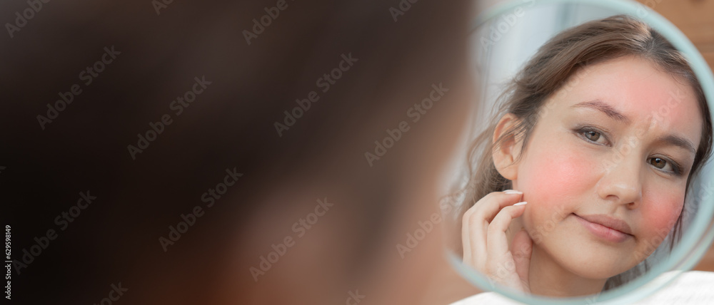 Young woman are worried about faces Dermatology and allergic to steroids in cosmetics. sensitive skin, red face from sunburn, acne, allergic to chemicals, rash on face. skin problems and beauty Young woman are worried about faces Dermatology and allergic to steroids in cosmetics. sensitive skin, red face from sunburn, acne, allergic to chemicals, rash on face. skin problems and beauty