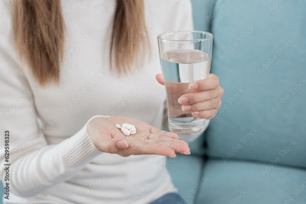 girl holding medicine and take medicine, pain, cure disease, sterilize, take vitamin, sedative, health care, Dietary supplement, medicine for medical treatment, tonic, daily dosage of medication girl holding medicine and take medicine, pain, cure disease, sterilize, take vitamin, sedative, health care, Dietary supplement, medicine for medical treatment, tonic, daily dosage of medication