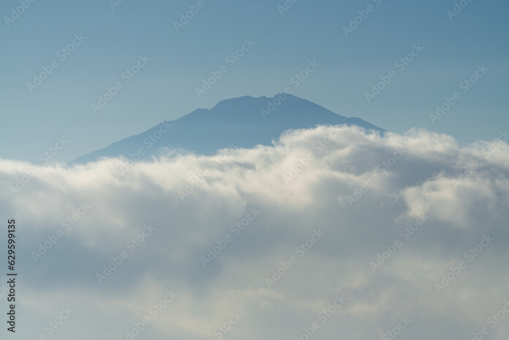 Peak of Merbabu Mountain with sea of clouds, Indonesia. Peak of Merbabu Mountain with sea of clouds, Indonesia.