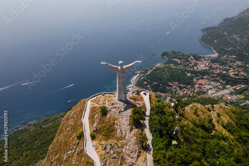 Aerial view of the Christ the Redeemer on top of the mountain at Maratea, Potenza, Basilicata, Italy. photo