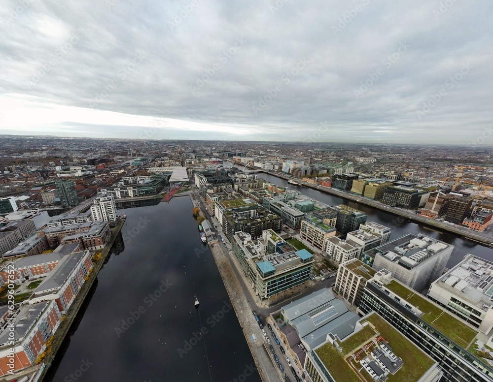 Aerial view of Dublin City with urban buildings and houses near Grand Canal