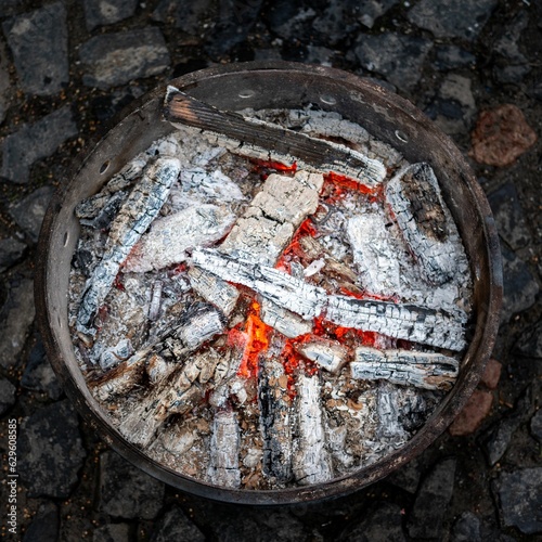 a closeup of a fireplace at a camp