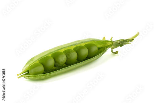 Close up of ripe green peas inside the pod.