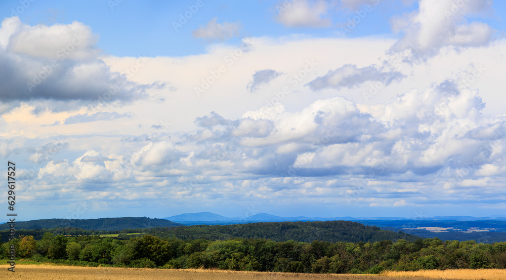 Blue sky with Comulus clouds over valley of river Main in Upper Franconia in Bavaria