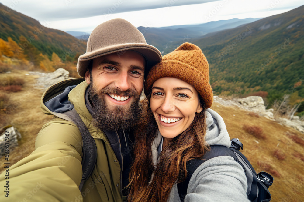 Generative AI portrait of happy couple man and woman tourist at top of mountain at sunset outdoors autumn fall season