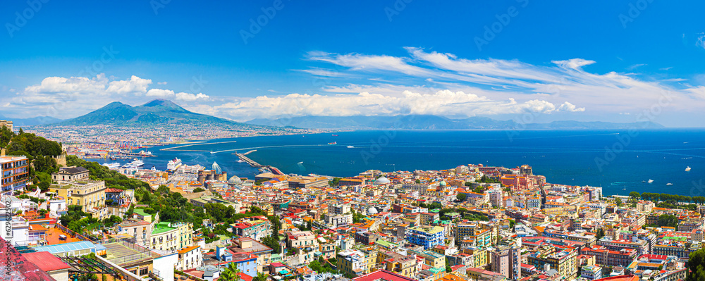 Naples, Italy. View of the city from above, with the Gulf of Naples and Mount Vesuvius. On the left the Hill of San Martino. Banner Header image. 2023-07-04.