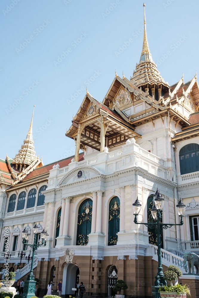 Closeup of the Dusit Maha Prasat Hall under the blue sky in Bangkok