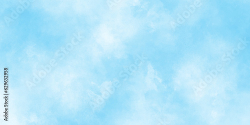 Abstract Creative and decorative blurred hand-painted and cloudy wet ink effect sky blue color watercolor background with stains and used as wallpaper, cover, card and design. 