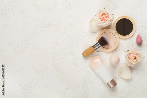 Composition with makeup products for skin tone on concrete background, top view