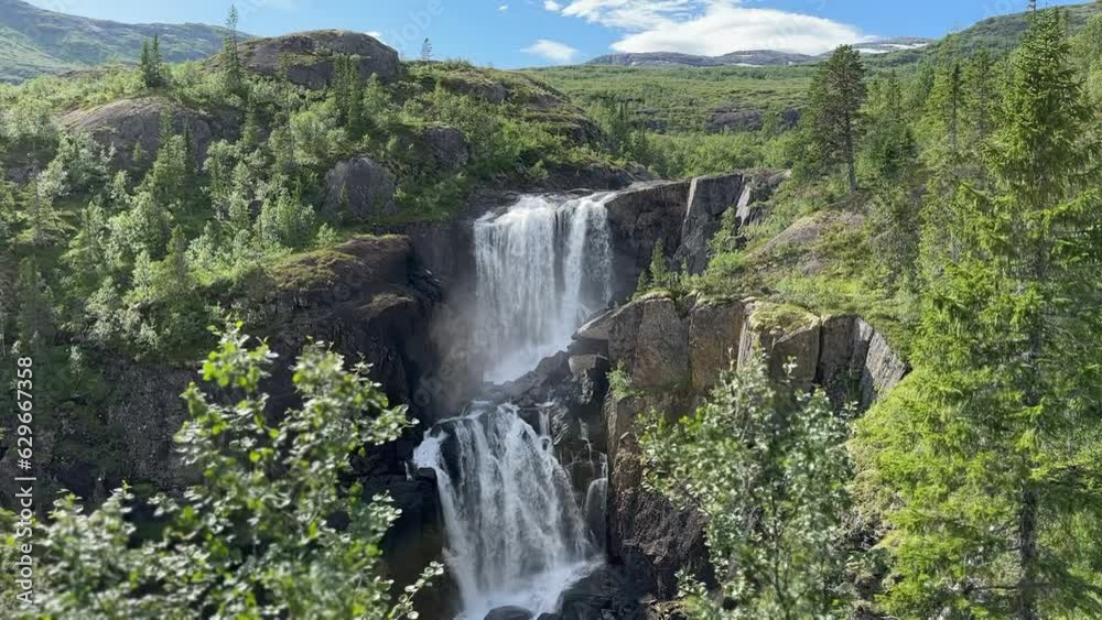 Waterfall in the Jordbru river in Grane municipality, Nordland county Waterfall in the Jordbru river in Grane municipality, Nordland county